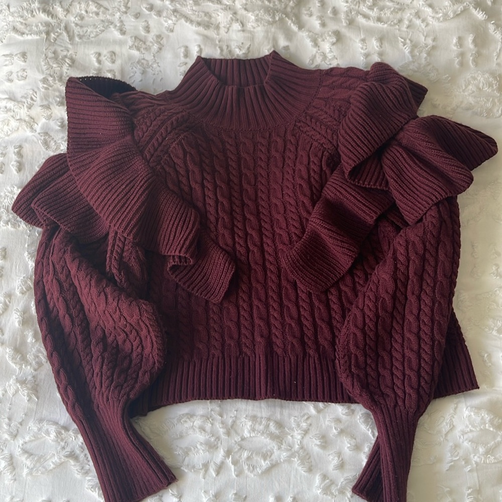 525 Cable mock neck flutter sweater